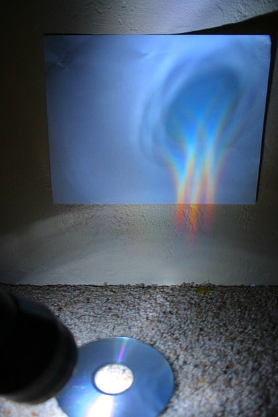 Making rainbow reflections with a flashlight