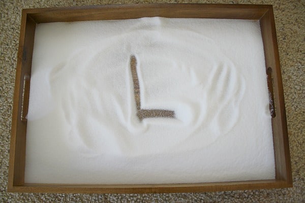 letters in salt tray