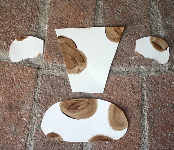 Cut out pieces for cow craft
