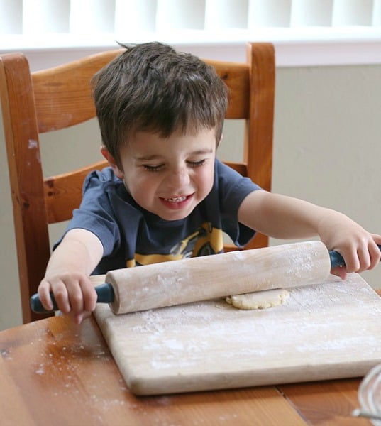 toddler making sugar cookies