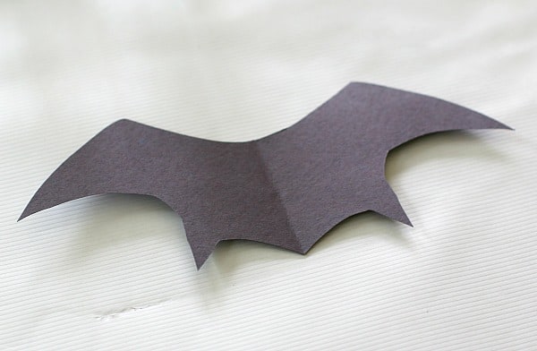 cut out bat wings from construction paper