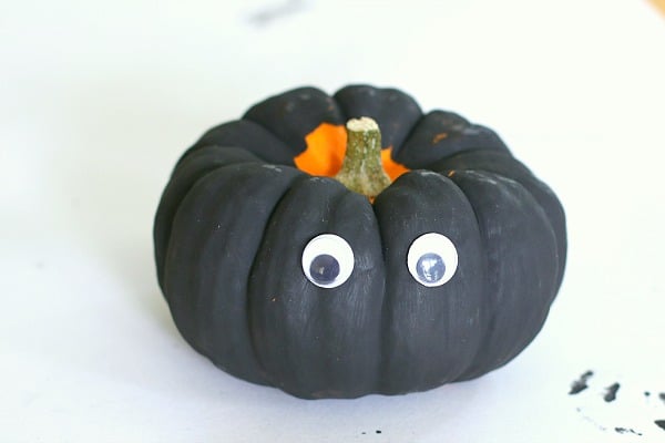 add googly eyes to your pumpkin
