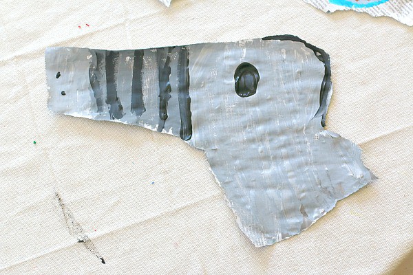 painting on torn newspaper