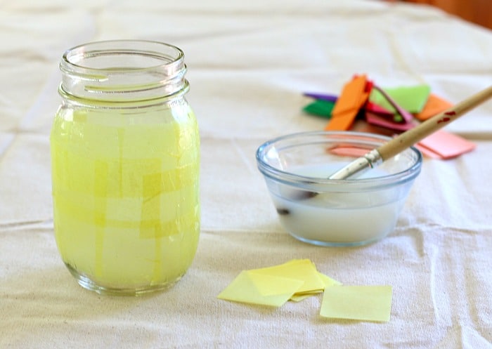 Add tissue paper to your jar using liquid starch