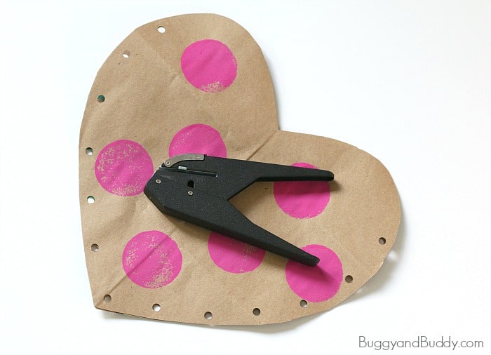 punch holes around your paper heart with a single hole punch