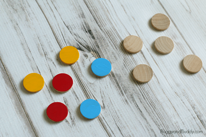 paint wooden circles for the magnet activity