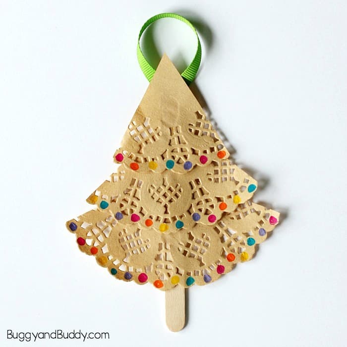 homemade christmas ornament craft for kids using paper doilies and popsicle sticks