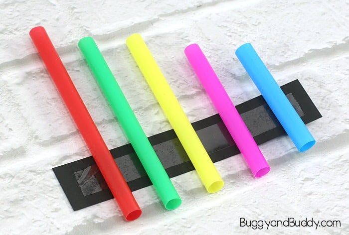 tape your straws onto the cardstock to make your pan flute science activity to explore sound