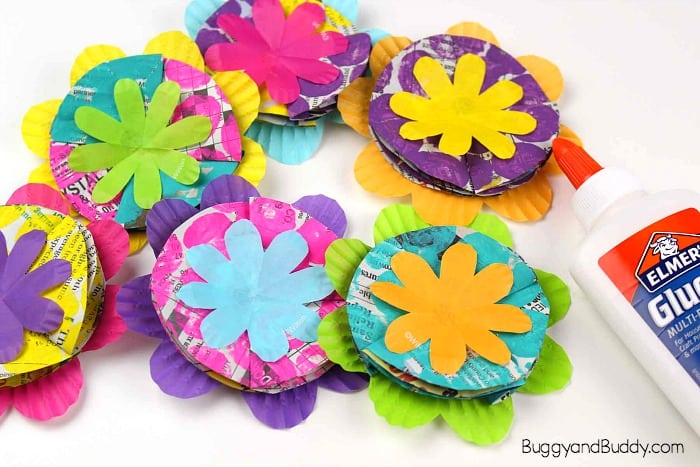 glue your cupcake liners and newspaper petals together to make your flower craft