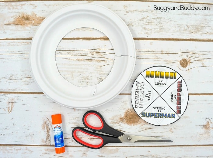 glue the second superhero template to another paper plate and cut it out