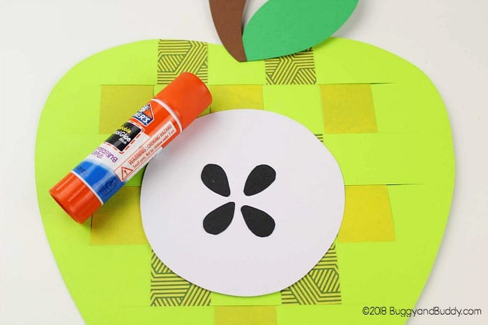 glue the core, stem and leaf onto your paper apple craft