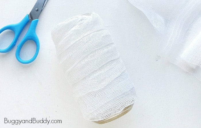 secure the top of your gauze to your mummy or ghost lantern craft