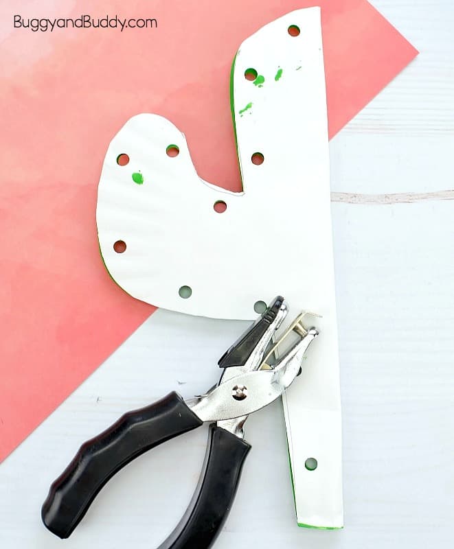 use a single hole punch to punch holes around your paper plate cactus craft